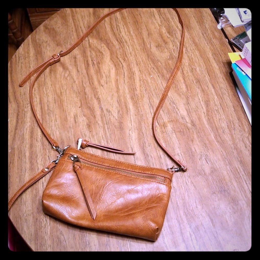 A cross body/clutch purse